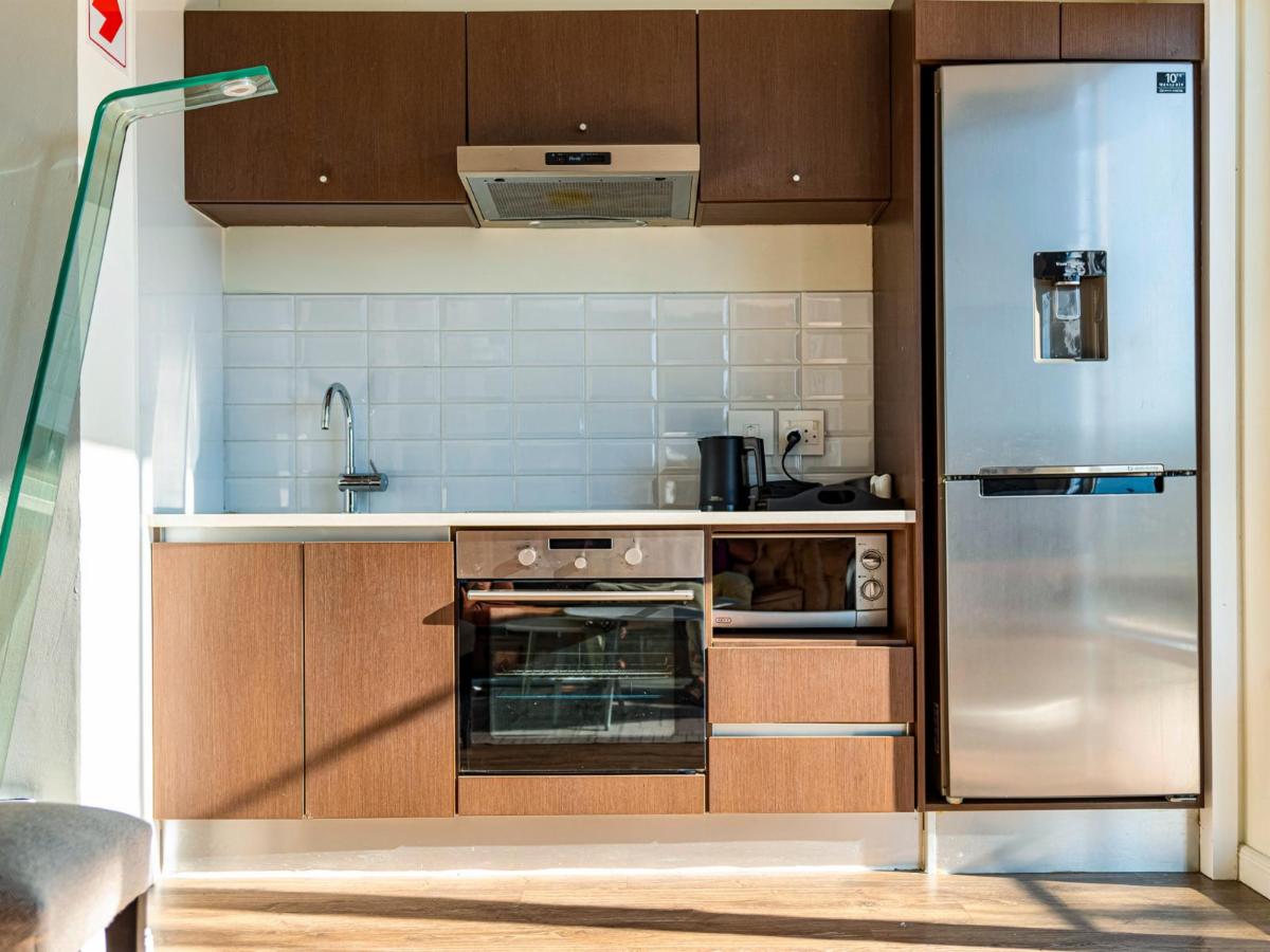 Crescent Suites kitchen and living area