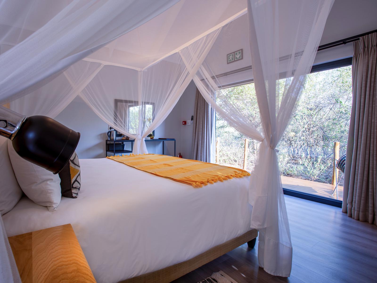 Roomtype 9: Bed Moya Safari Lodge & Villa