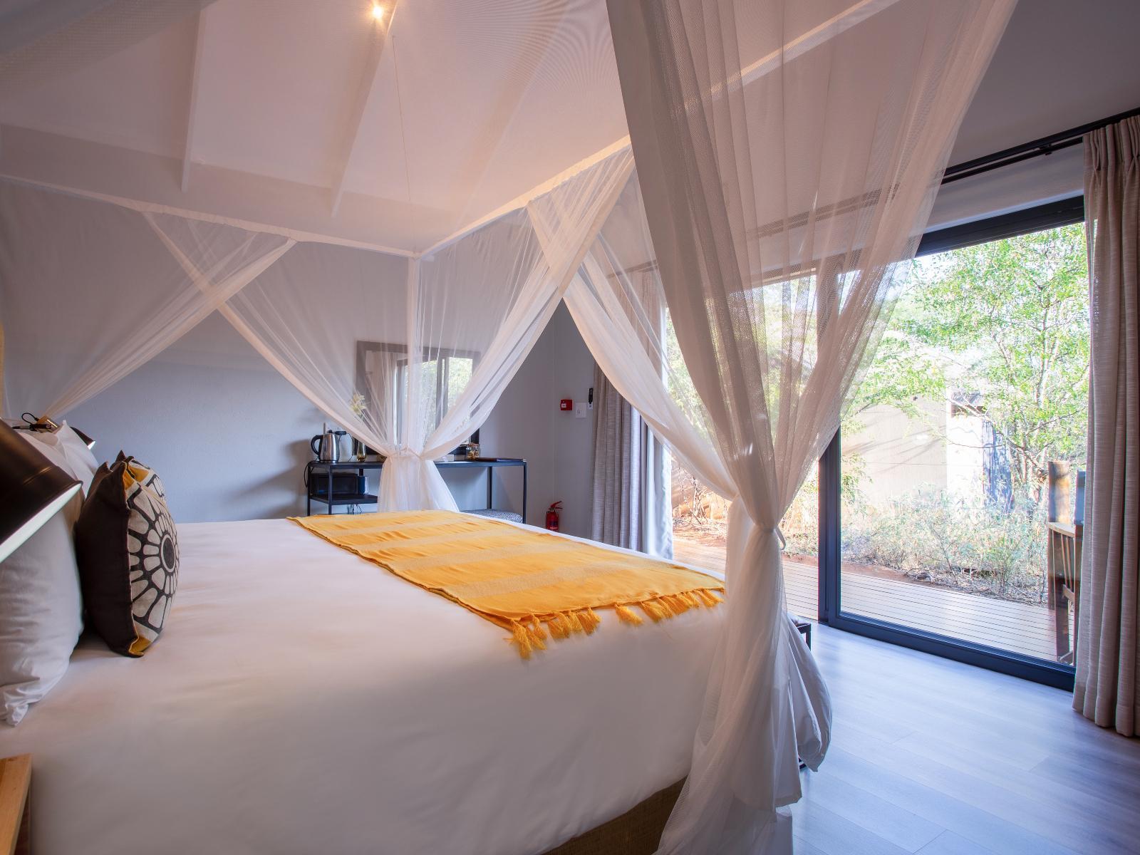 Roomtype 8: Bed Moya Safari Lodge & Villa