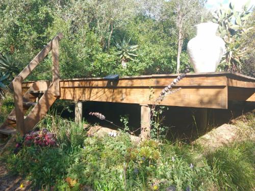 Milkwood Wooden deck campsite