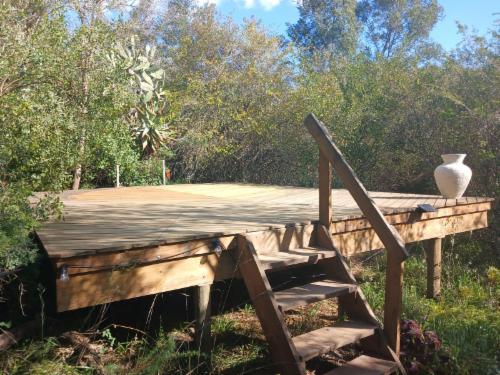 Milkwood Wooden deck campsite